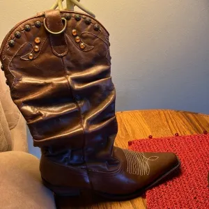 Steve Madden women’s leather jeweled cowgirl boots.  Size 8M. Preowned.