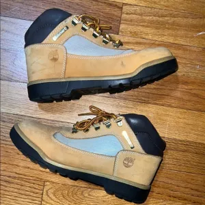 Timberland Tan and Black Winter Boots with Durable Soles