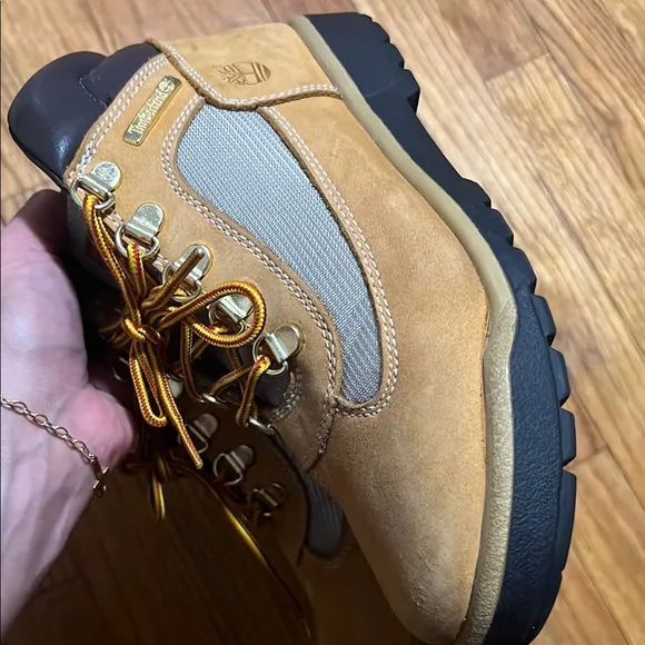 Timberland Tan and Black Winter Boots with Durable Soles