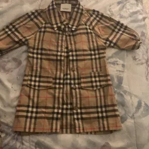 Toddler Burberry dress and shoes.
