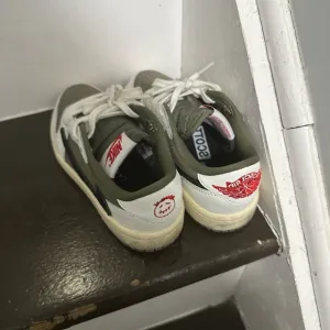 Travis Scott Green and White Sneakers