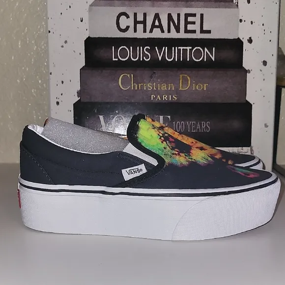 Vans Black and Orange Slip-On Platform Sneakers with Psychedelic Design