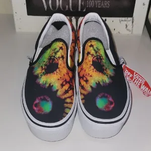 Vans Black and Orange Slip-On Platform Sneakers with Psychedelic Design
