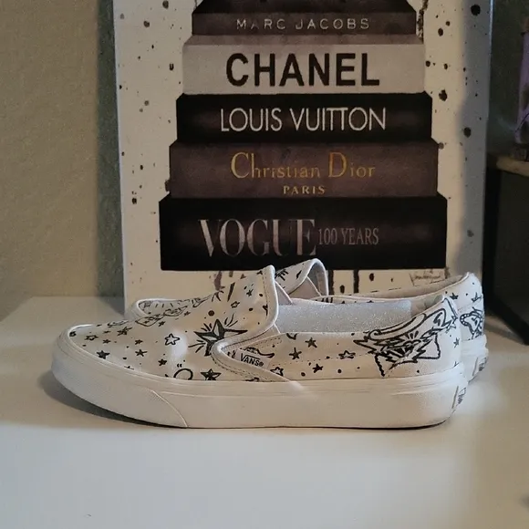 Vans White and Black Graphic Slip-On Sneakers
