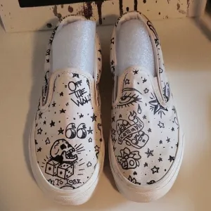 Vans White and Black Graphic Slip-On Sneakers