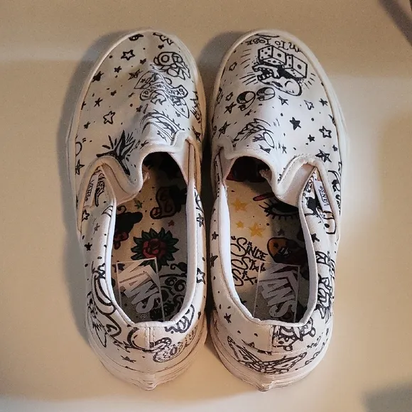 Vans White and Black Graphic Slip-On Sneakers