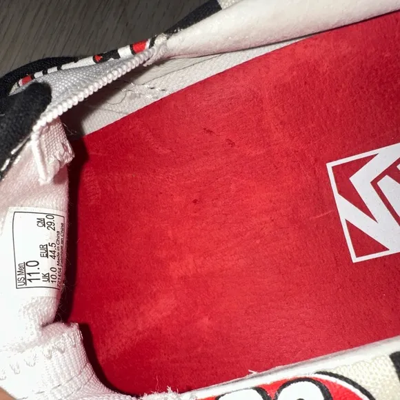 Vans X Supreme Slip-On Sneakers with 666 Design