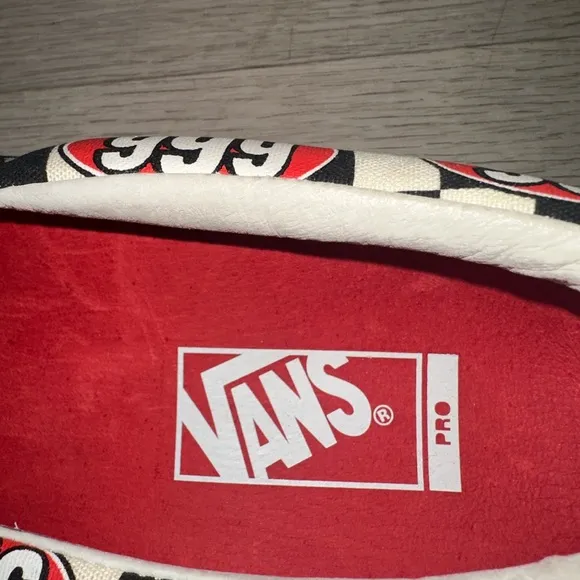 Vans X Supreme Slip-On Sneakers with 666 Design