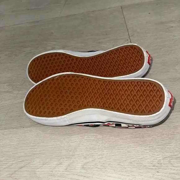 Vans X Supreme Slip-On Sneakers with 666 Design