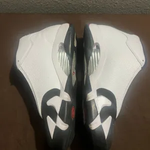 White and Black Athletic Sneakers Retro 14 Black Toe 2024