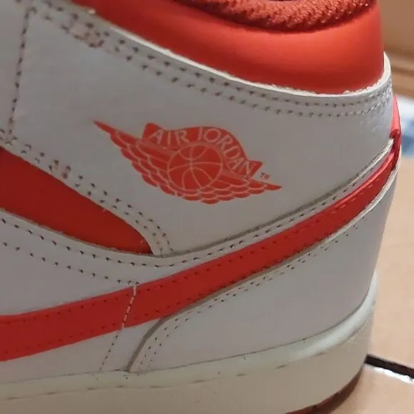 White and Orange Nike Sneakers