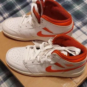 White and Orange Nike Sneakers