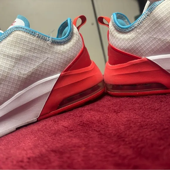White and Red Sneakers with Blue Accents