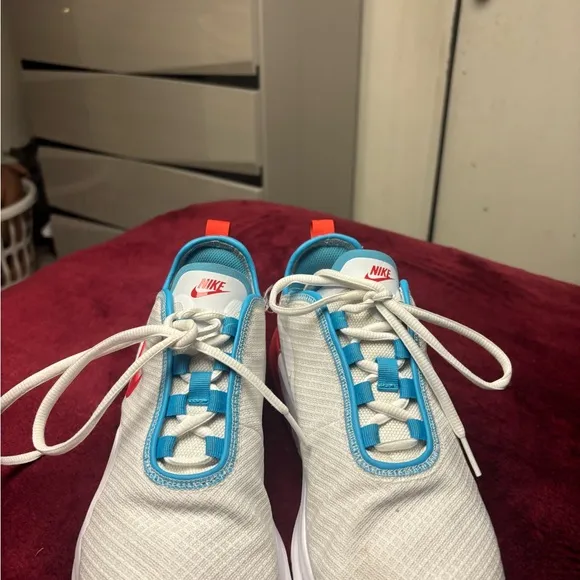 White and Red Sneakers with Blue Accents