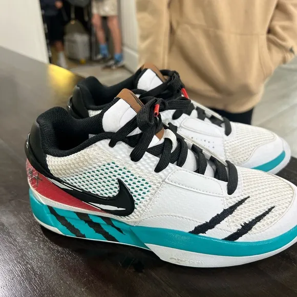 White and Teal Athletic Sneakers