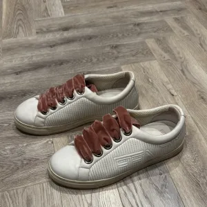 White Sneakers with Red Velvet Laces
